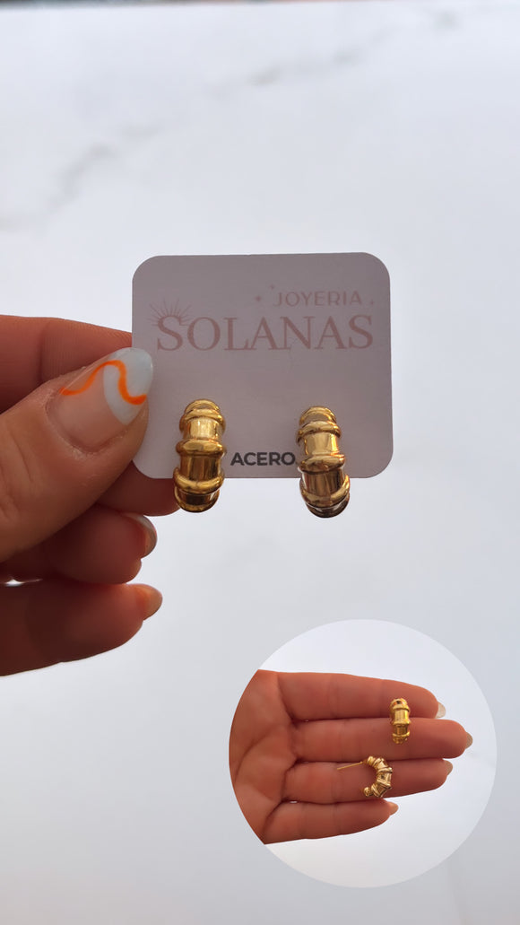 Aros Acero Dorado . Carmela