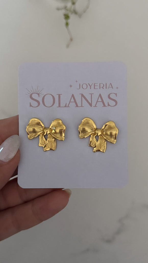 Aros Acero Dorado . Paz